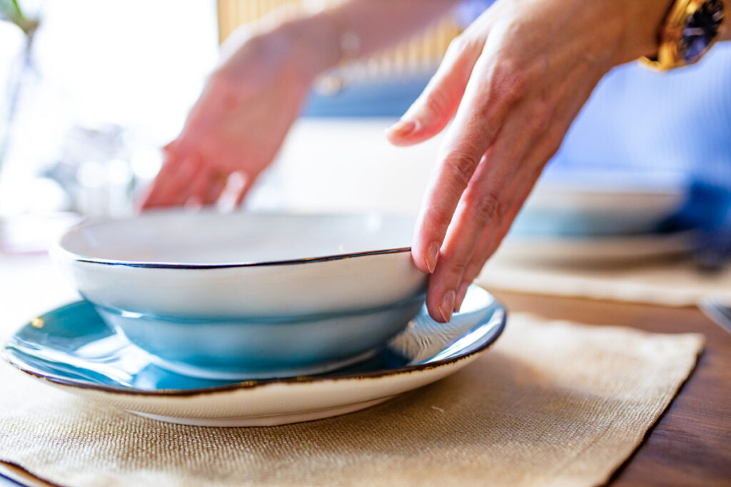 a-housewife-woman-setting-a-table-in-day-light-roo-2024-10-31-04-28-44-utc