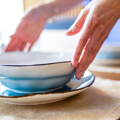 a-housewife-woman-setting-a-table-in-day-light-roo-2024-10-31-04-28-44-utc